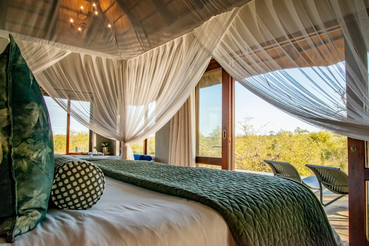 Arathusa Safari Lodge bush_facing_suite_bedroom7.webp