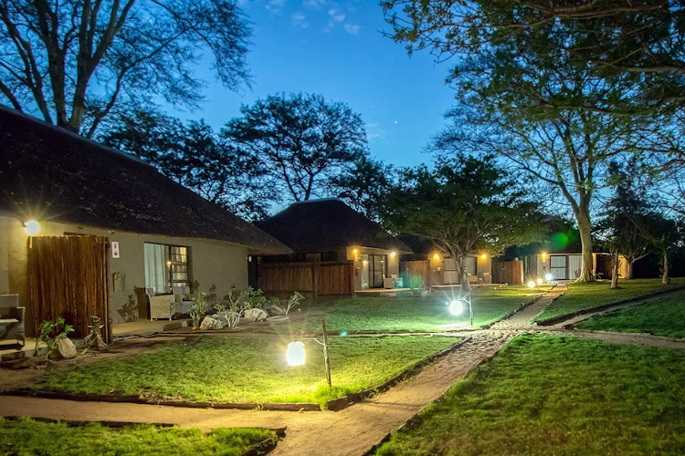 Xanatseni Private Camp tuin.webp