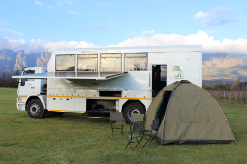 nomad truck met tent.png