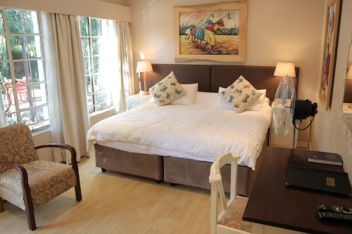 travellers guest house kamer.png