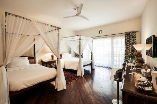 safari park hotel kamer met 2 dubbele bedden.png