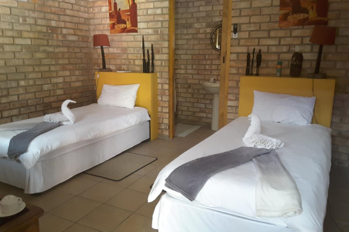 melissa  guest house kamer 2 aparte bedden.png