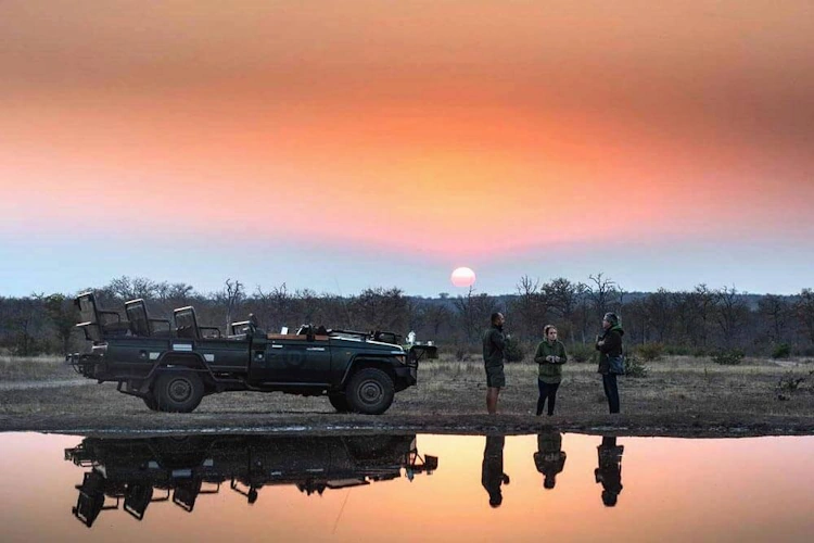 Xanatseni Private Camp sundowner.webp