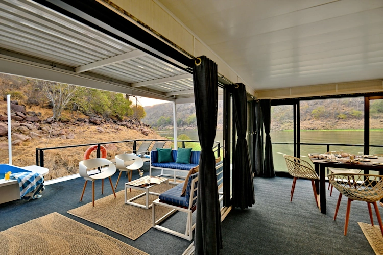 1760362537850zambezi-trader-c-deck-dinning---pool-area--1-.webp